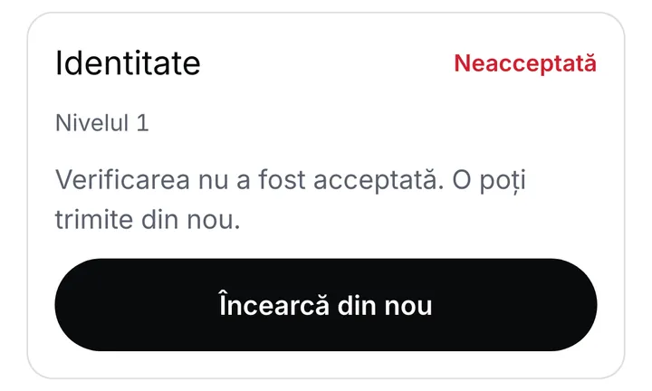 Secțiunea Identitate marcată Neacceptată, care spune că verificarea poate fi trimisă din nou, cu butonul Încearcă din nou
