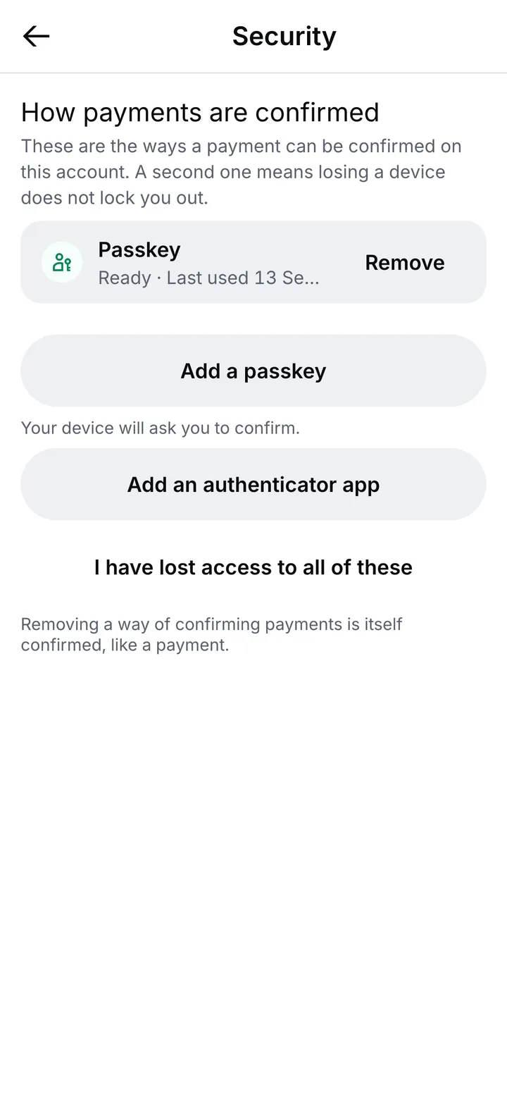 The Security settings: a passkey with its Remove button, and the note that removing a way of confirming payments is itself confirmed, like a payment